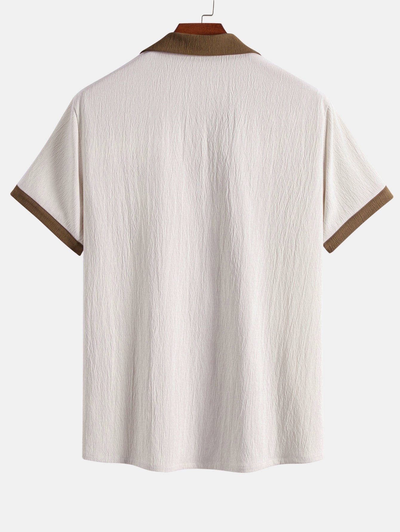 Camisa arrugada con bordado de palmeras en contraste