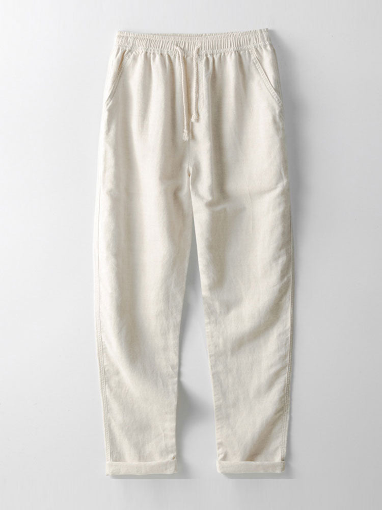 Camisa de manga corta con botones y efecto lino, y pantalones rectos de lino