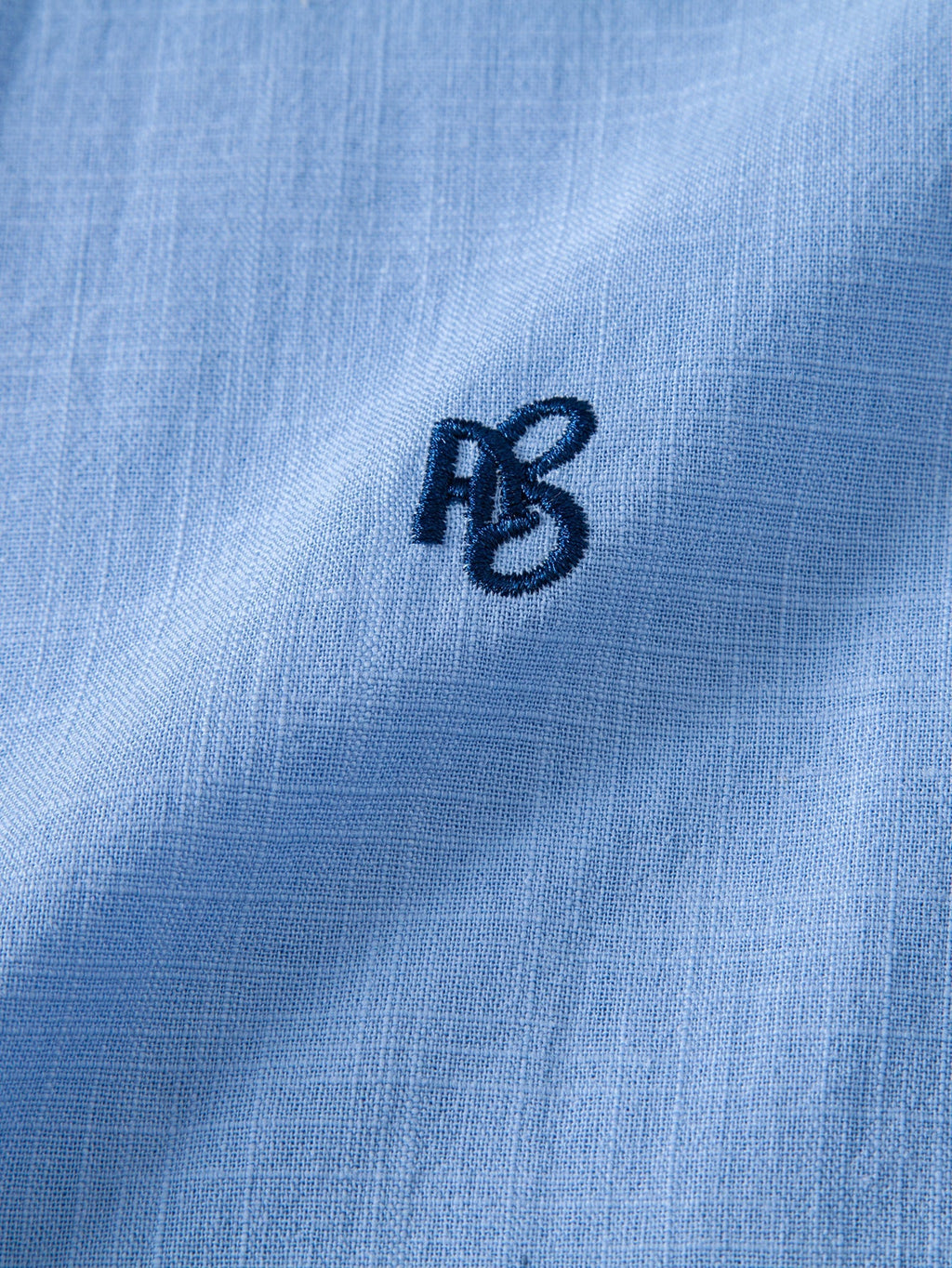 Camisa de manga corta con botones y efecto lino